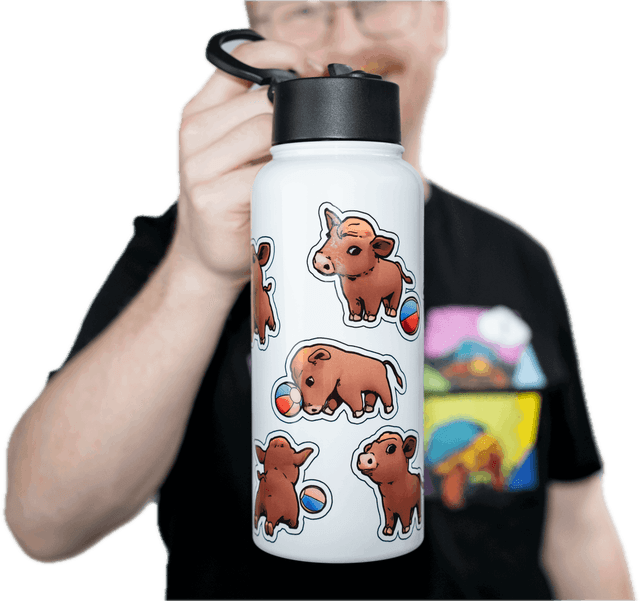 Jacob holding the Winnie The Moo Water Bottle